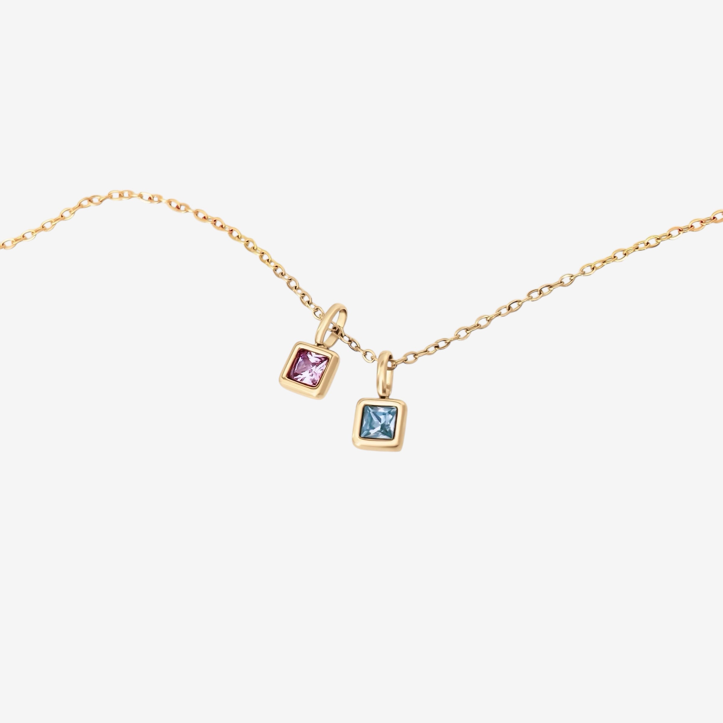 Gold Abel birthstone necklace shown on a simple chain with personalized square-cut gemstone charm, displayed on a white background