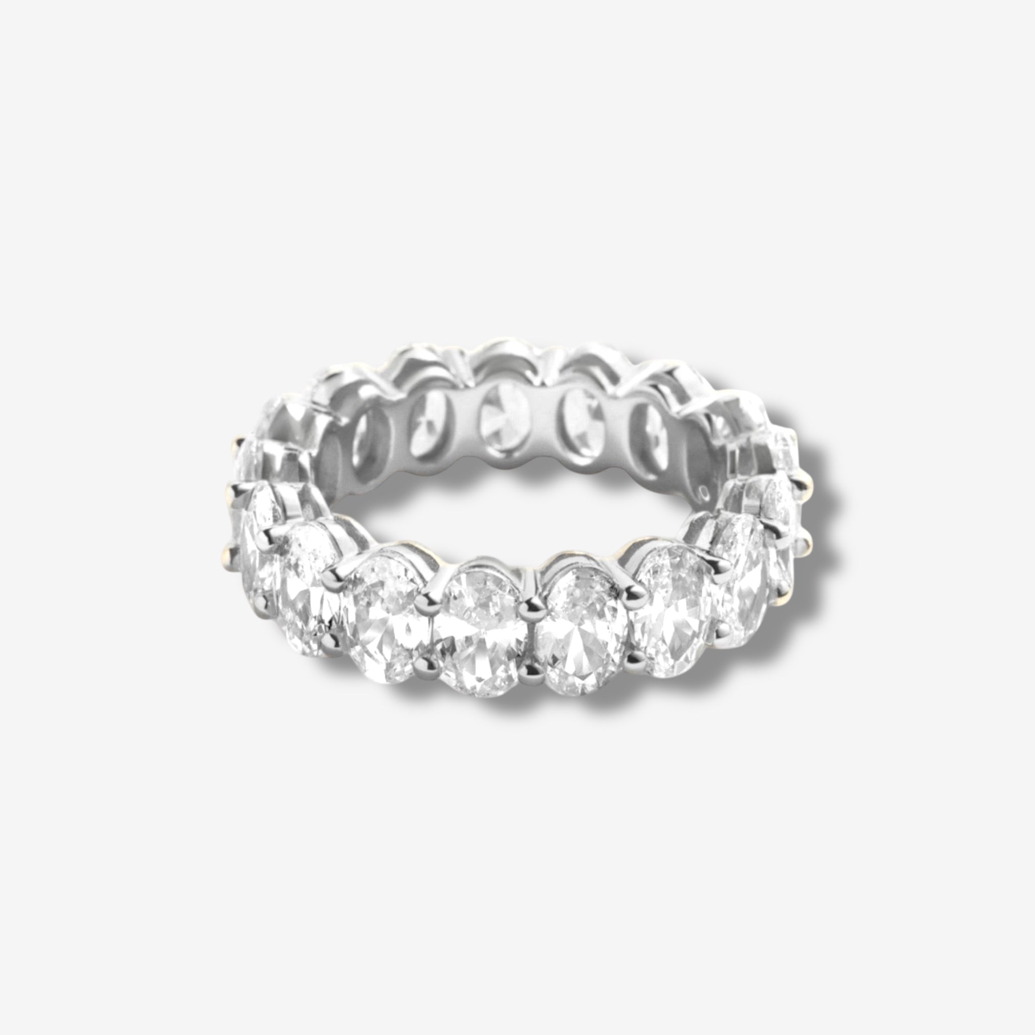 Bella Ring in silver featuring a 5mm x 7mm oval cut simulated diamond set in rhodium plated sterling silver, displayed on a white background.