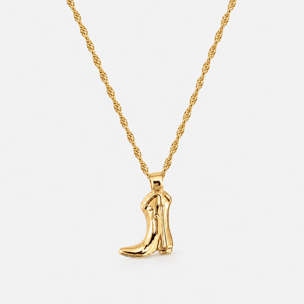 Boots & Broadway gold cowgirl boot pendant necklace with polished twist chain on white background