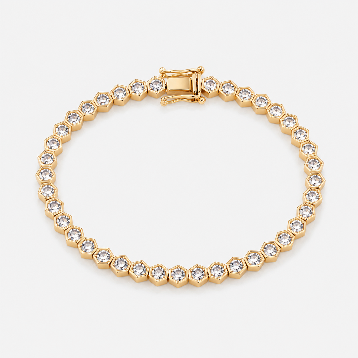 Gold hexagon tennis bracelet with sparkling CZ stones and polished 14k gold plated finish