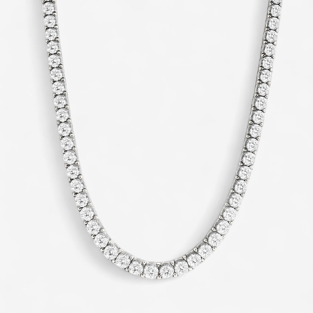 Luxxy Mia Tennis necklace in silver on light gray backdrop. Affordable luxury jewelry by Luxxy