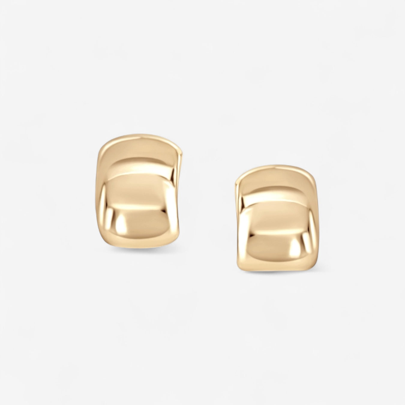 Brookes Curved Stud Earrings: 14k gold plated studs with a smooth, modern, square-shaped design, shown on a plain white background.