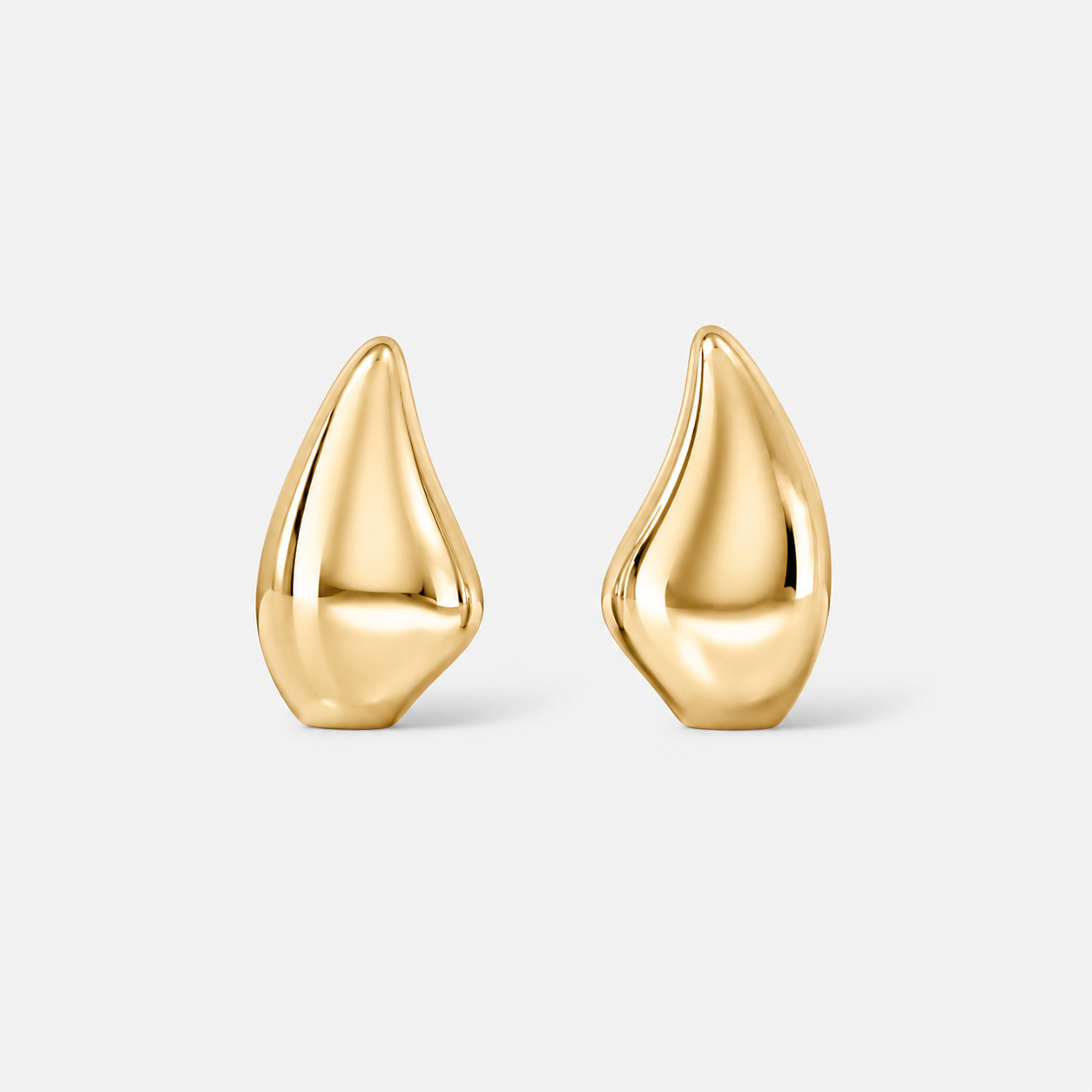 Demi Earrings in gold minimalist 14k gold plated brass stud earrings displayed on plain white background