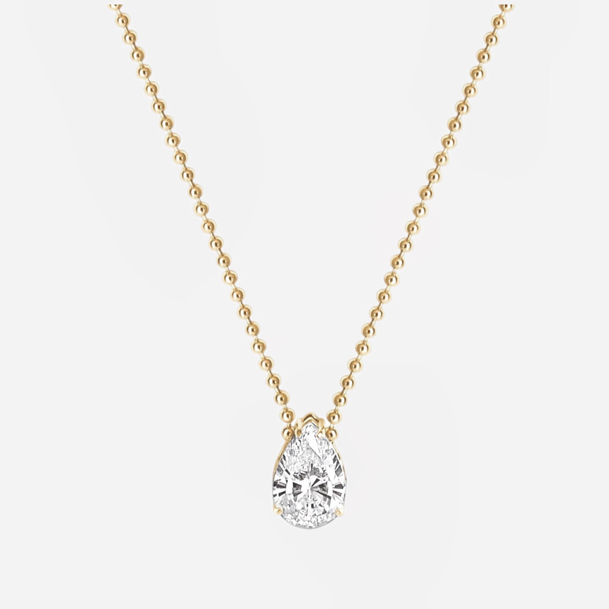Luxxy 14k gold necklace with a teardrop-shaped cz diamond pendant | Affordable luxury jewelry by Luxxy