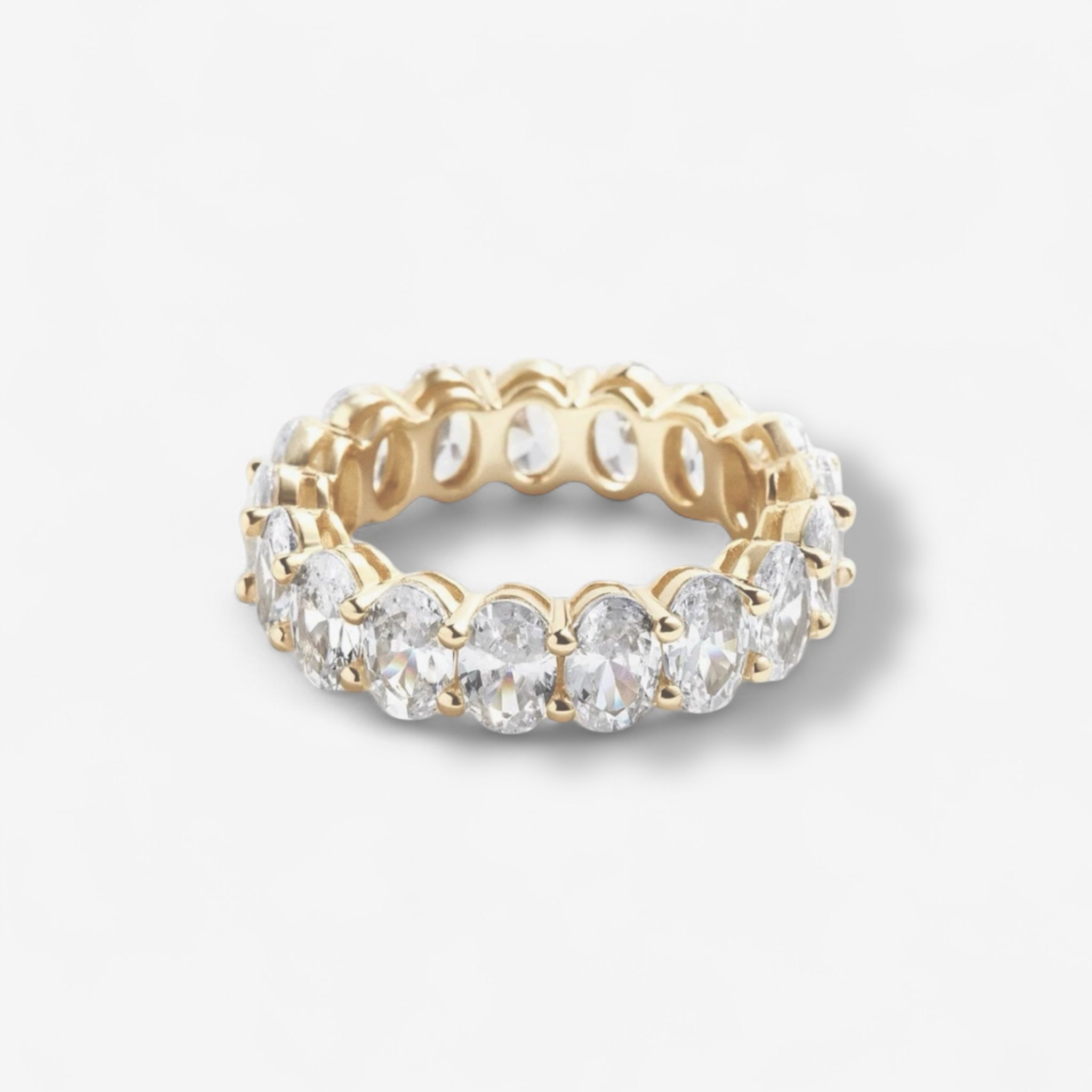 bella ring in gold with 360 degrees oval simulated diamonds cubic zirconia | luxury affordable jewelry by luxxy