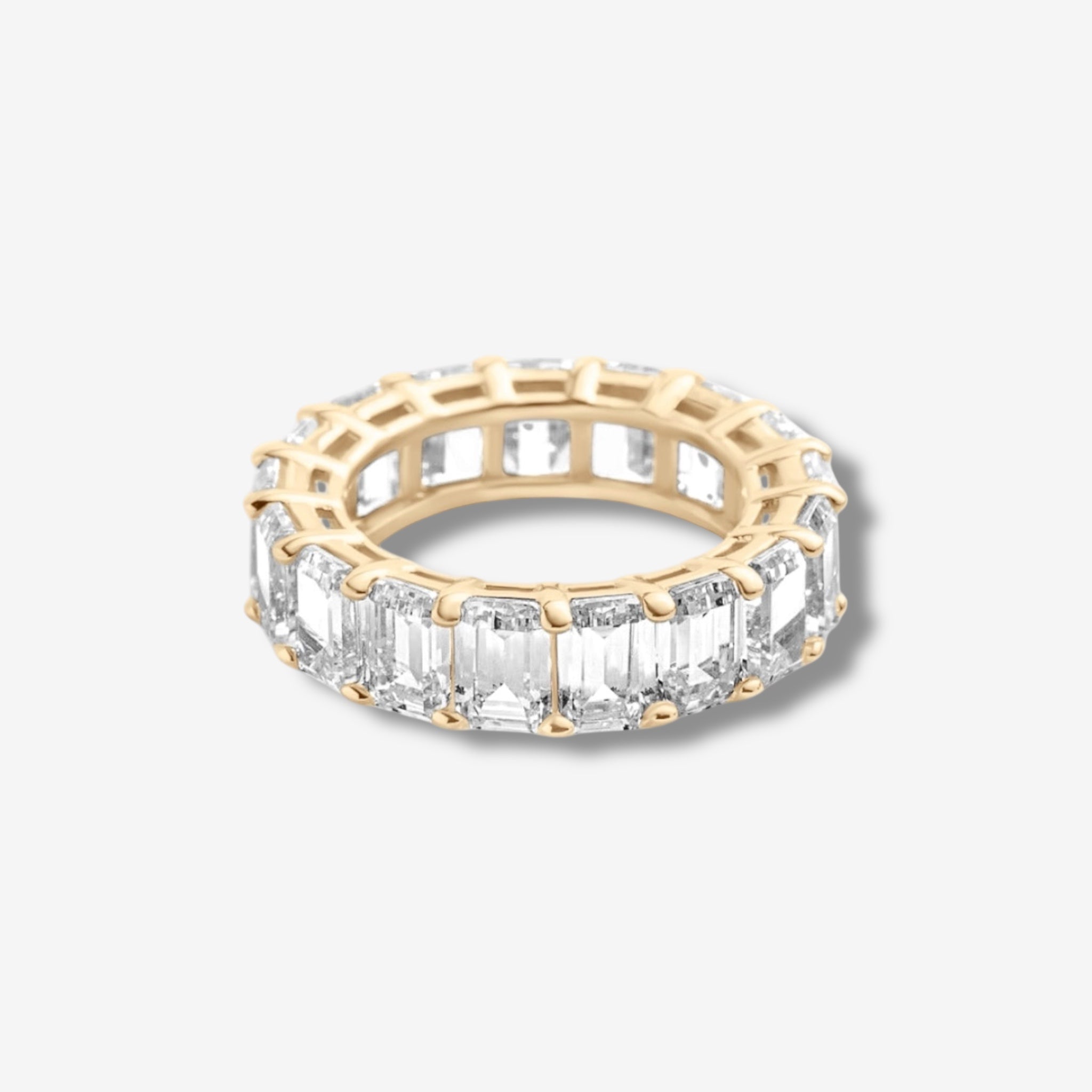 britt ring in gold with 360 degrees of emerald cut simulated diamonds | luxxy jewelry