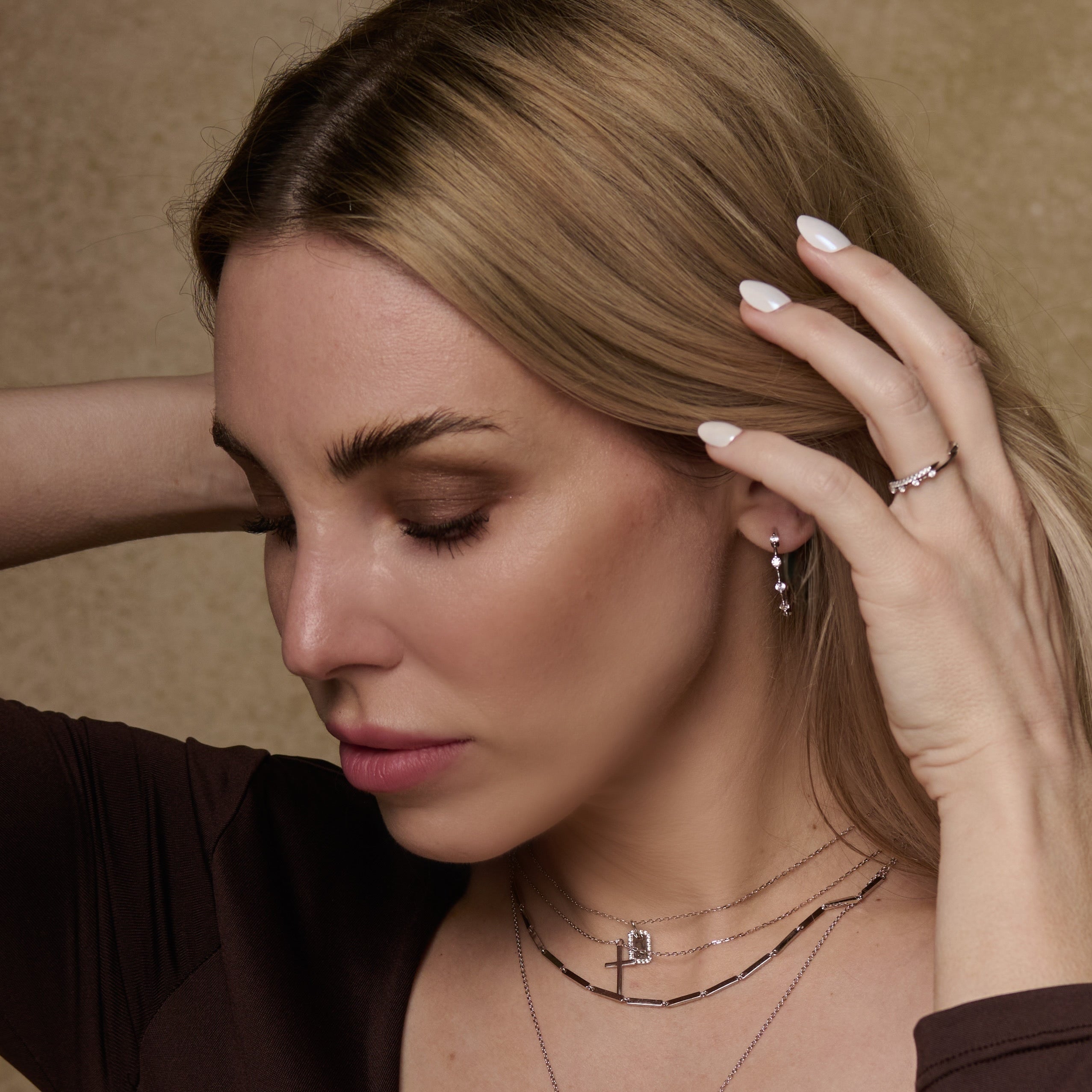 Woman wearing Meliss Sparkle Hoop Earrings and Necklaces in Silver - Luxxy Jewelry | Affordable Luxury Jewelry